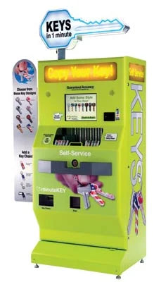 Self-service key copying kiosk; bright green, displays various key styles.