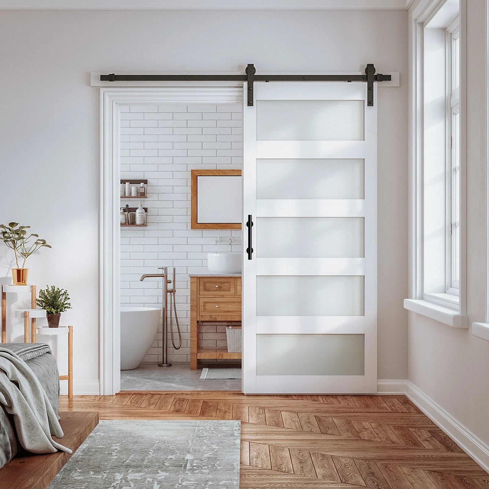 White modern barn door with frosted glass panels, shown in a contemporary bathroom setting.